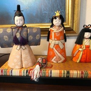 Set of three Vintage Dolls, a Ball and a wooden covered silk stand